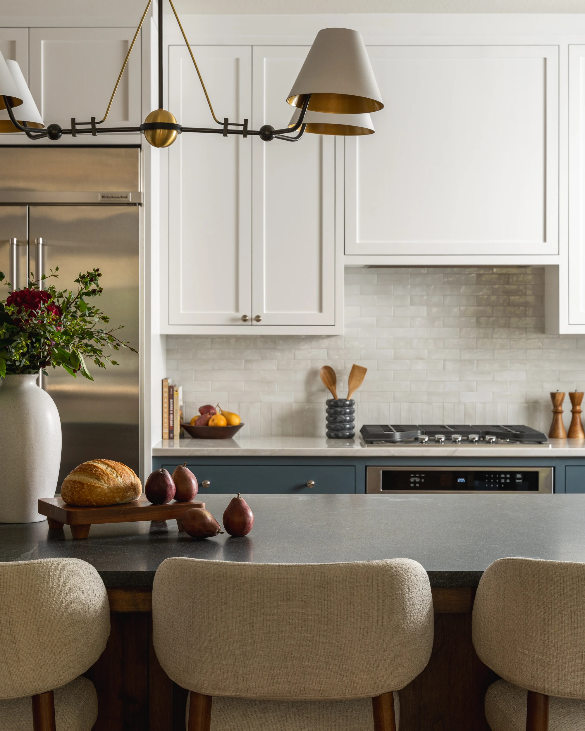 Virginia Mist island edge in front of the range and upholstered stools
