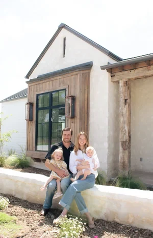 The Pearson Dabney Homes family outside the finished house