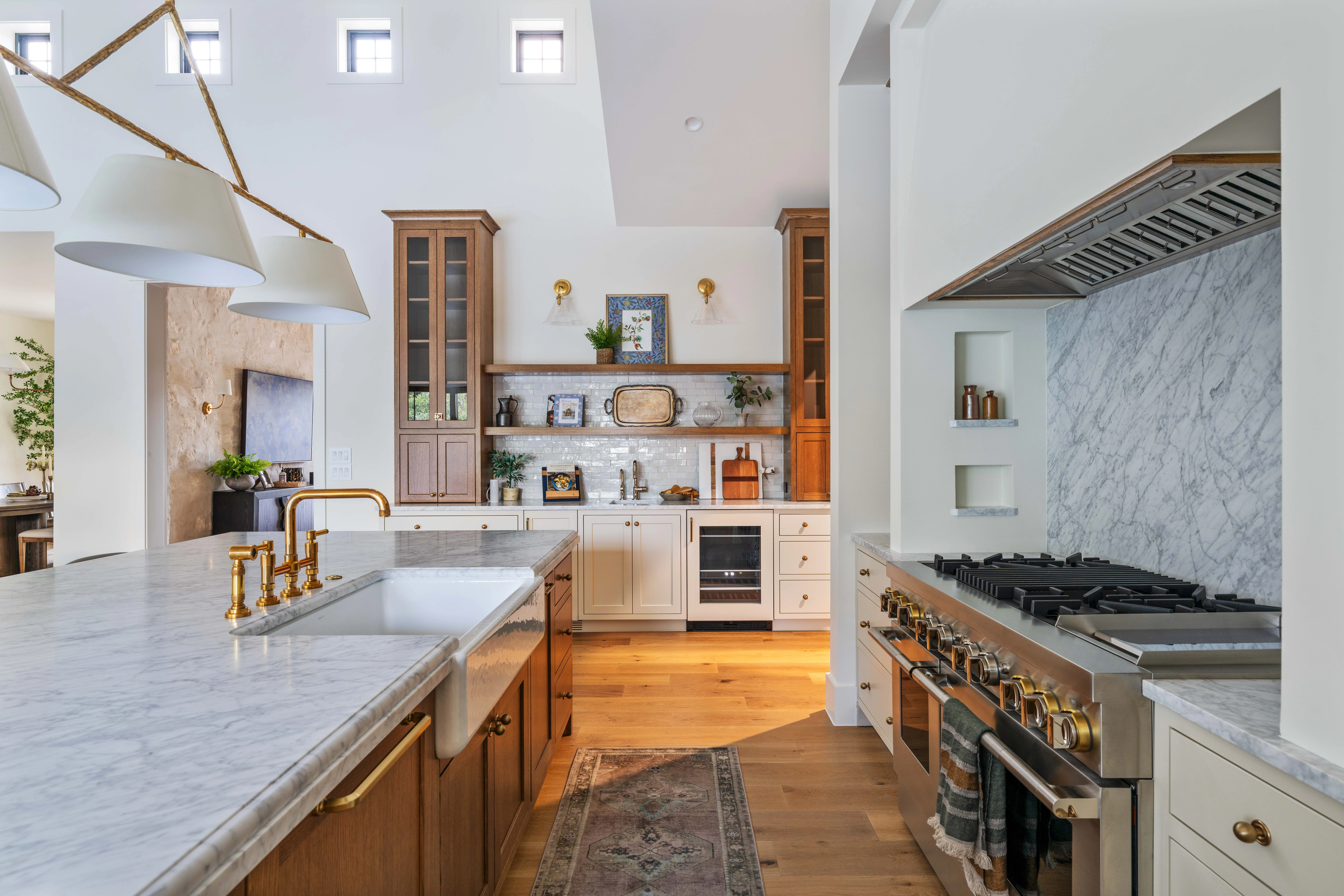 Oak cabinetry and the range run seen across the kitchen
