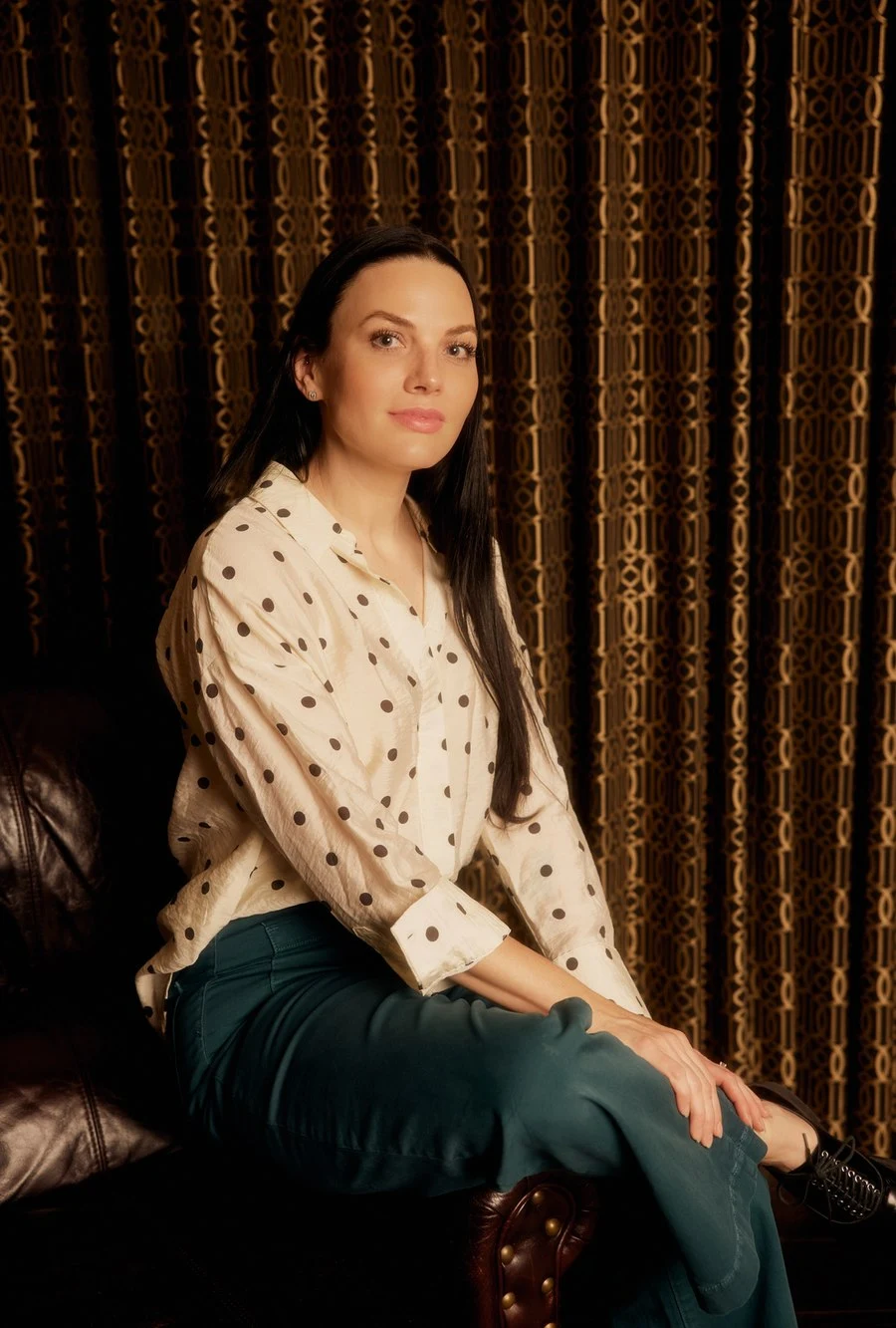The Casa Sisu designer seated in a leather chair