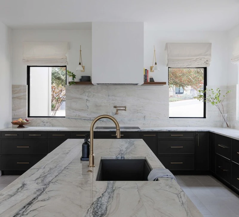 Undermount sink in the Fantasy Lux counter run beneath a window
