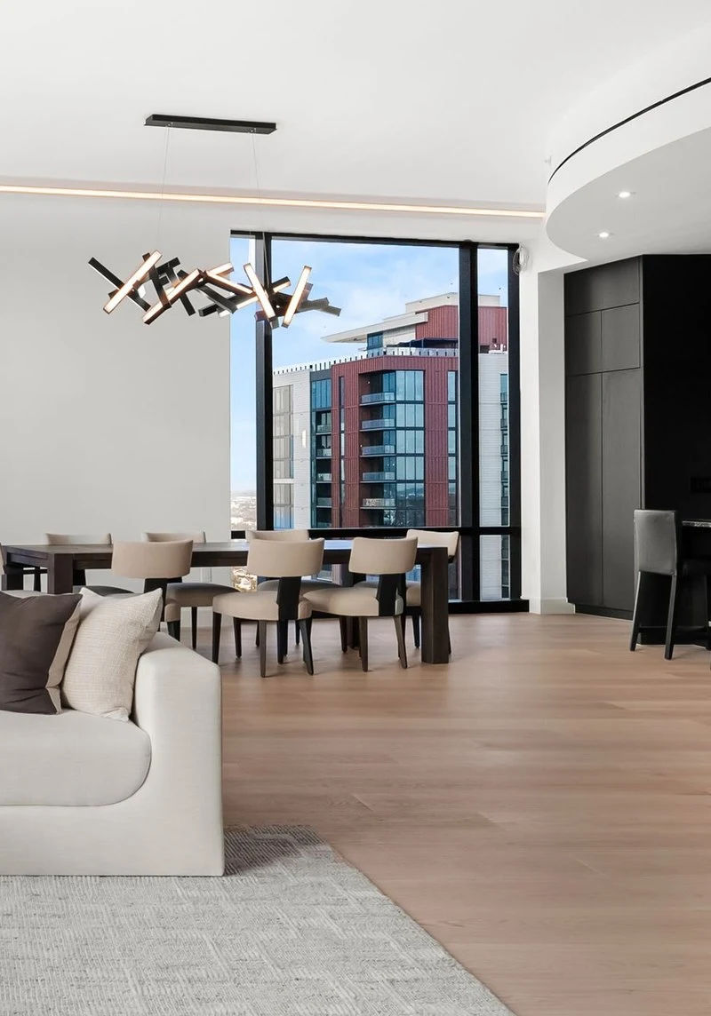 Dining table seen across the lounge seating