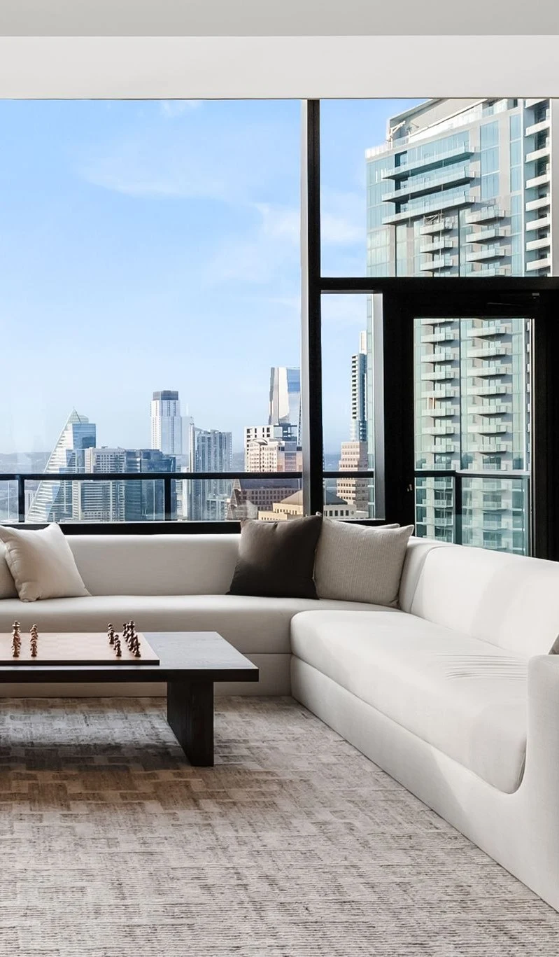 Sectional and chess table with the skyline beyond