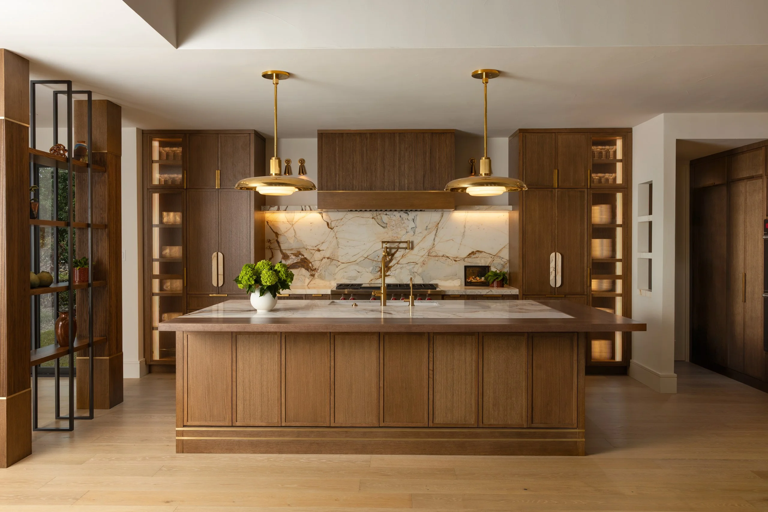 San Antonio kitchen with an oak island and brass pendant lighting